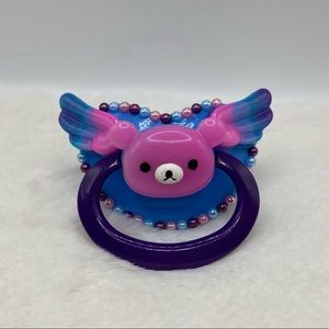 Pink rilakkuma adult pacifier